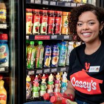 Foto de Casey's de: Team Member stocking the cooler
