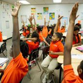 Foto de KIPP Schools de: Tall college hands at KIPP Vision Academy during a math class